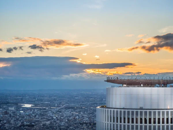 Helipad on a tall building and view and beautiful aerial view  with tall buildings and blue sky sunlight