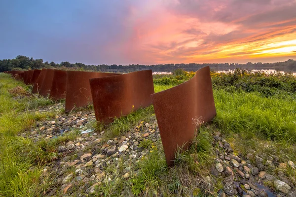 Row Rusty Metal Curved Objects Landscape Lake Sunset Piccardthofplas Groningen — Stock Photo, Image