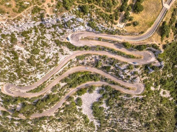 Aerial top down view of Hairbpin bend road — Stock Photo, Image