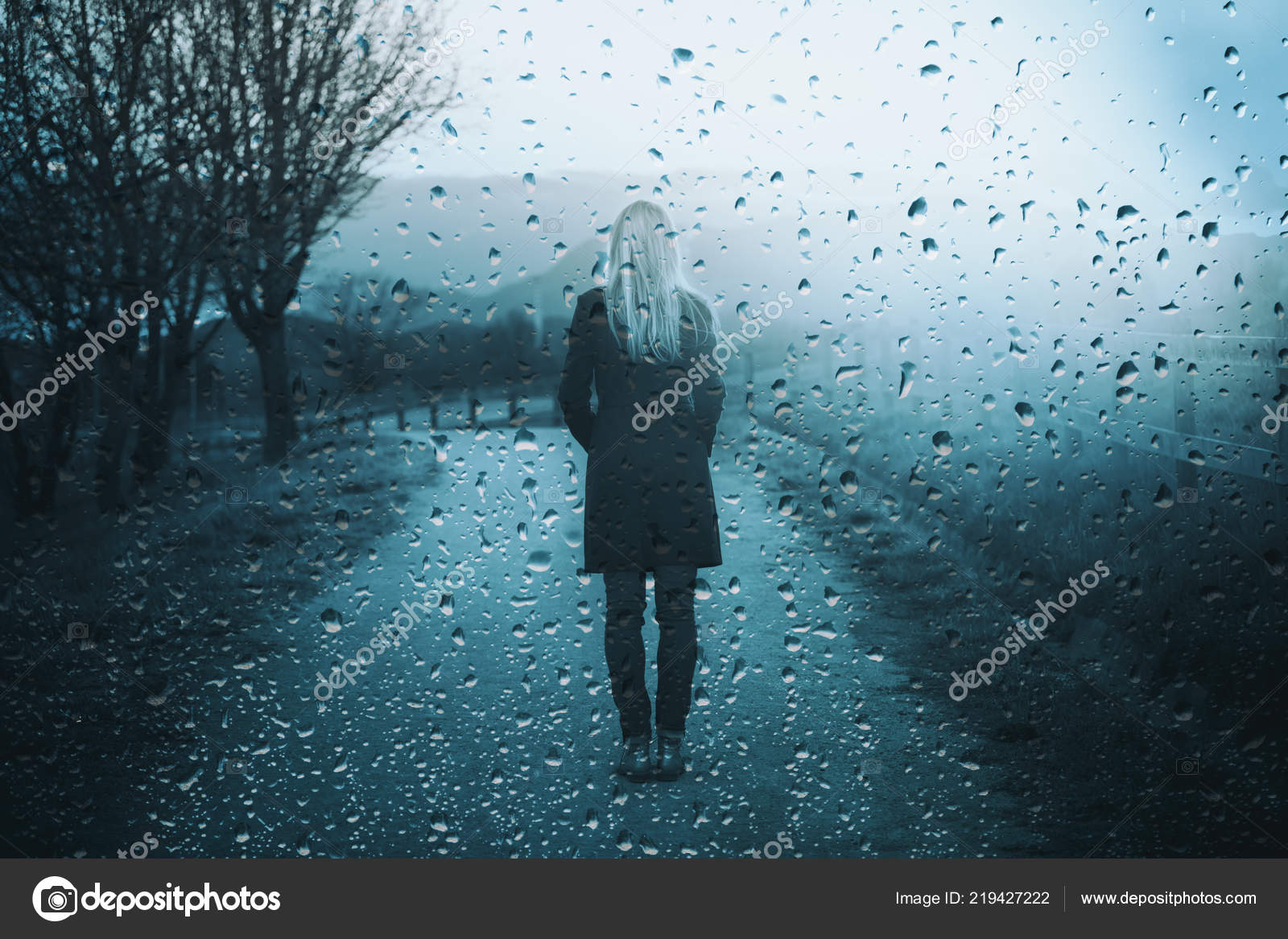 Back View Lonely Sad Woman Standing Outdoor Artistic Rain Drops Stock Photo  by ©robsonphoto 219427222
