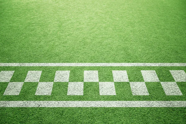 Sunny Artificial Green Grass Painted Start Finish Line Pattern Ground — Stock Photo, Image