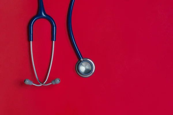 Top View Blue Stethoscope Red Background Check Heart Health Check — Stock Photo, Image