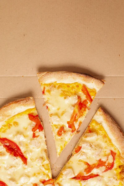 Tasty pizza in box