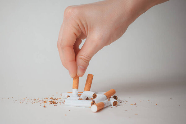 Quit smoking - hand crushing cigarettes