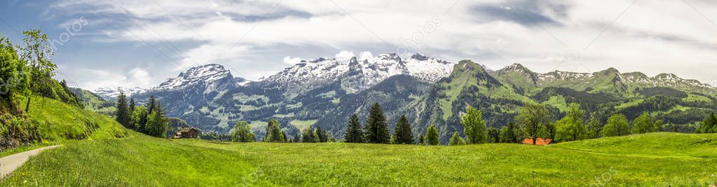 Stunning landscape panorama of Swiss Alps, Fronalpstock, Klingenstock and Chaiserstock near Illgau.