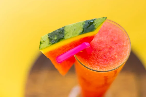 Healthy watermelon smoothie in glass with watermelon and straw o — Stock Photo, Image