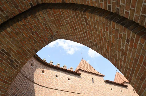 Brick arch at the  Barbican, a historic fortification in Warsaw, Poland.