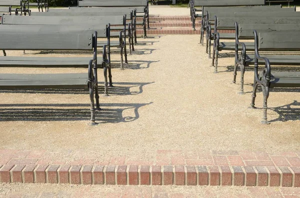 Benches at  Royal Baths Park in Warsaw, Poland.