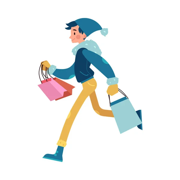 Illustration vectorielle de l'homme avec des sacs à provisions colorés dans un style de dessin animé plat . — Image vectorielle