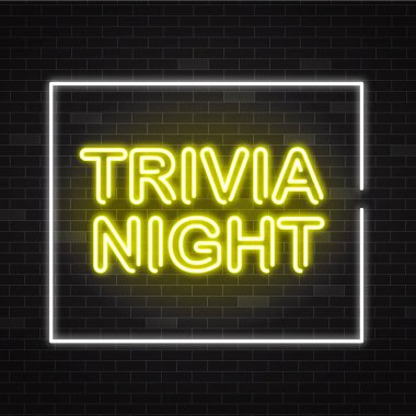 Trivia night yellow neon sign in white frame on dark brick wall background. clipart