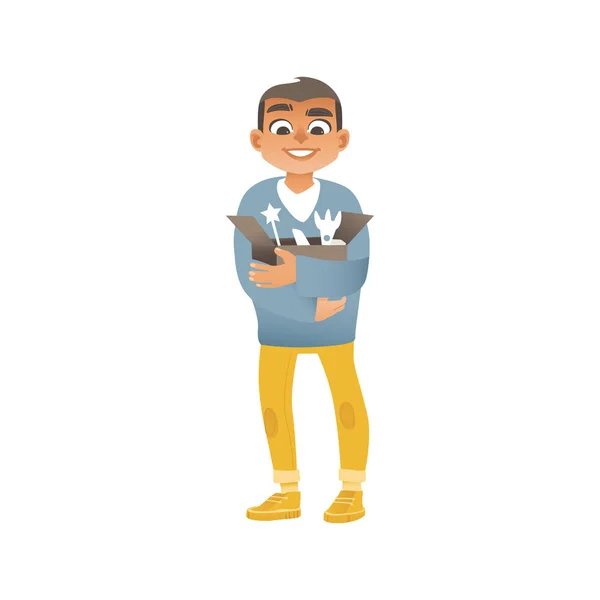 Ein Junge in Jeans, Pullover und Turnschuhen hält eine Schachtel mit Kinderspielzeug in der Hand. — Stockvektor