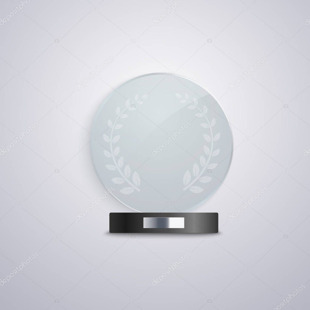 Realistic glass circle award mockup on black base with blank silver plaque.