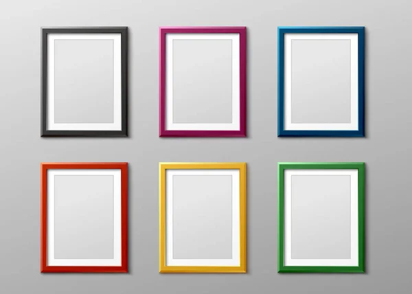 Colorful empty photo frame set hanging on grey wall - blank mockup — Stock Vector