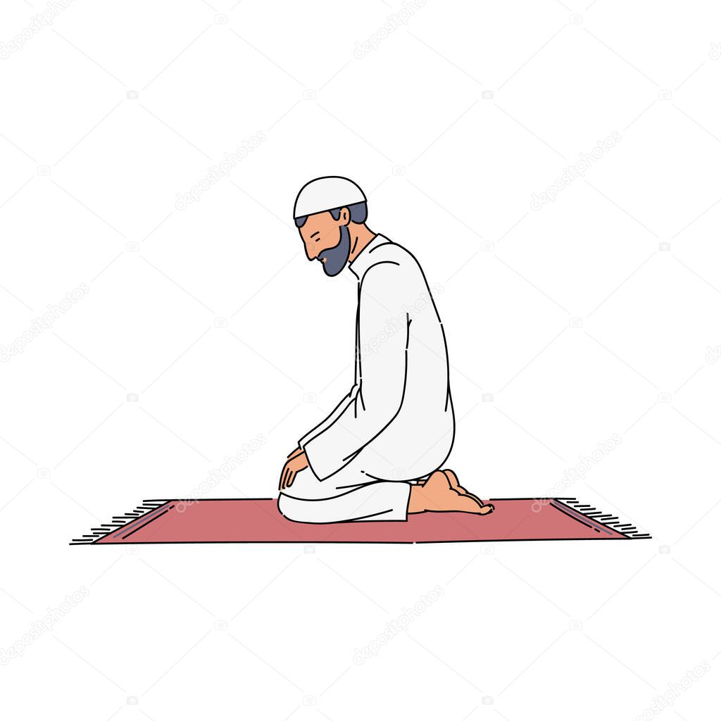 Islam religion - Muslim man sitting on a carpet on his knees in a prayer.