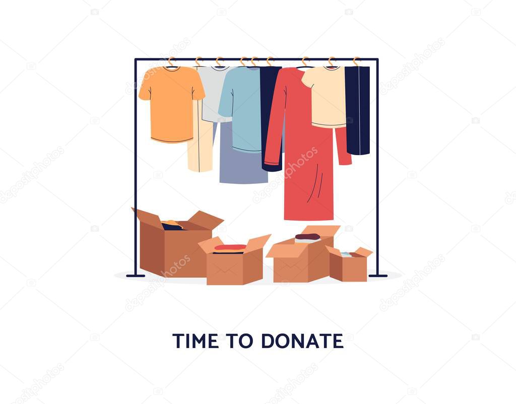 Clothes donation concept - clothing rack and cardboard boxes