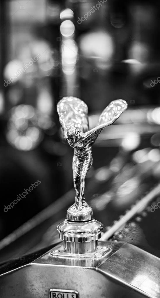 Black and white, abstract classic Rolls Royce emblem.