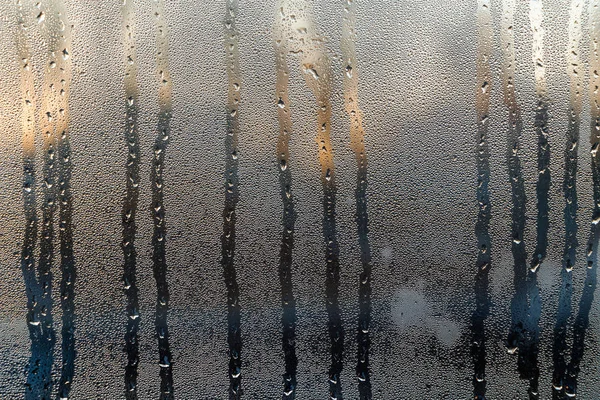 日の出の背景にある曇ったガラス — ストック写真