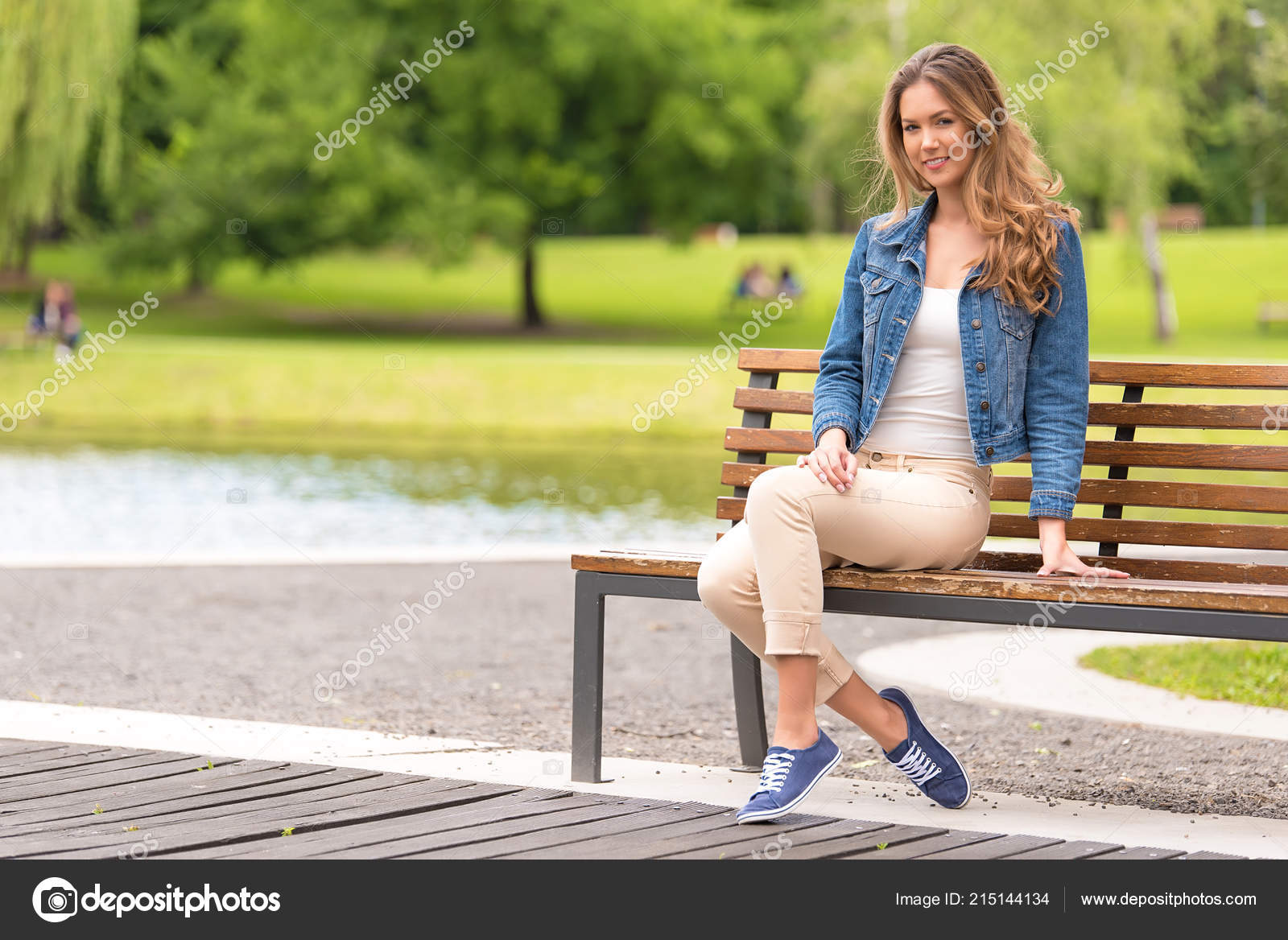 Young Woman Sitting Bench Park Stock Photo