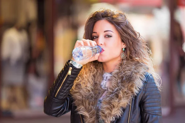 Beautiful woman drinking — Stock Photo, Image