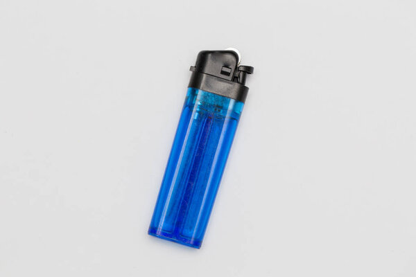 used blue lighter isolated with white