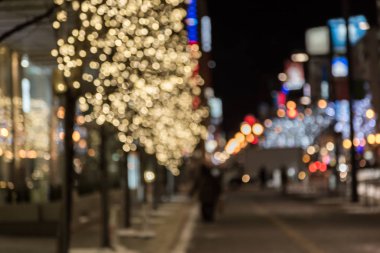 Odak trafiğinden, ışıklardan ve Japonya 'daki Sapporo Hokkaido' daki insanlardan.