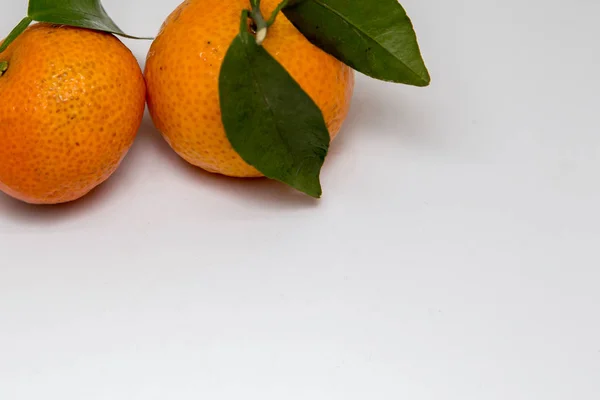 Tangerine and mandarin orange isolated on white , mandarin orange are symbolic to  Fruits of Prosperity and Chinese new year, Chinese New Year Concept (image selective focus)