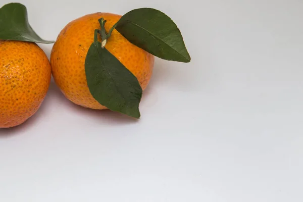 Tangerine and mandarin orange isolated on white , mandarin orange are symbolic to  Fruits of Prosperity and Chinese new year, Chinese New Year Concept (image selective focus)
