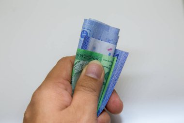 Bir el kapmak bir para Ringgit Malezya Notlar (Rm)