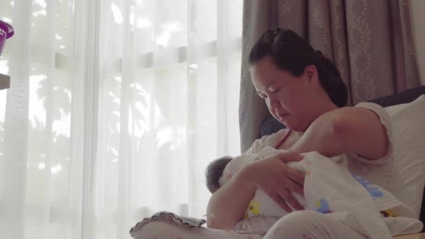 Asian Mother Holding Her Baby Breast Feeding Home Close Chinese — Stock Video