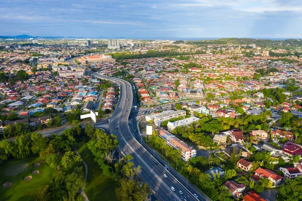 Aerial image of car moving on Kota Kinabalu City, Sabah, Malaysia