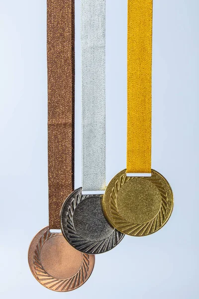 Gold medal, silver medal and bronze medal concept for winning or success