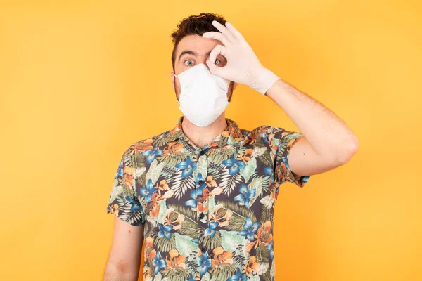 Handsome Young Man Protective Mask Doing Gesture Shocked Surprised Face — Stock Photo, Image