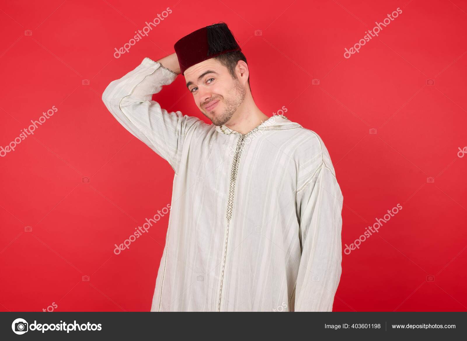 Handsome Young Man Wearing Traditional Turkish Hat Fez Confused