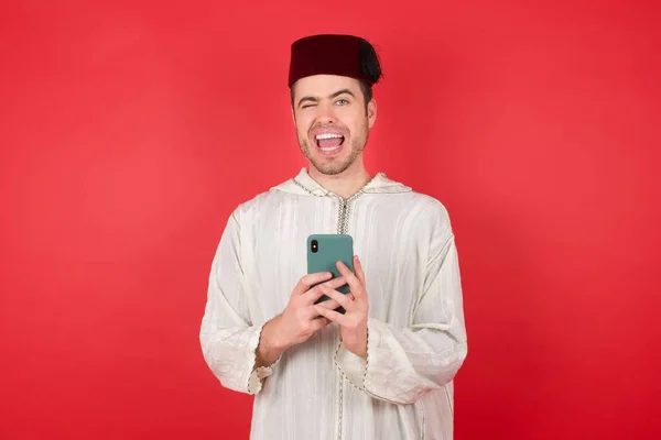 Happy Funny Smiling Man Studio Mobile Phone — Stock Photo, Image