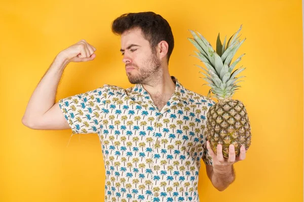 Handsome Young Man Posing Pineapple Yellow Background Studio Shot — Stock Photo, Image