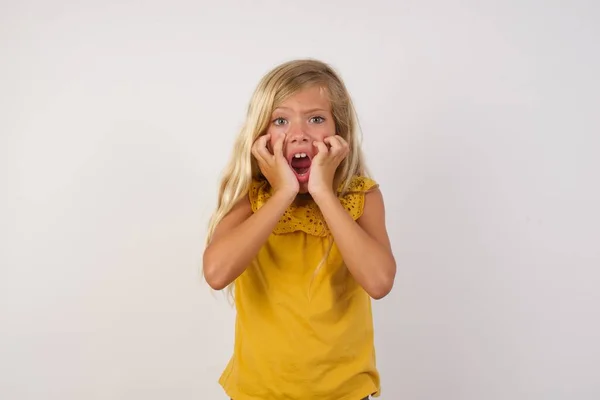 Cute Little Girl Expresses Excitement Thrill Keeps Jaw Dropped Hands — Stock Photo, Image