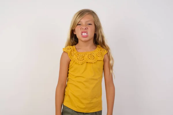 Portrait Angry Cute Little Girl Keeps Teeth Clenched Frowns Face — Stock Photo, Image