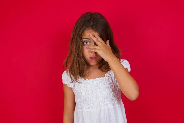 Cute Little Girl Peeking Shock Covering Face Eyes Hand Looking — Stock Photo, Image
