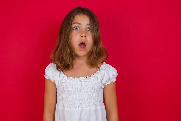 Little Caucasian Girl Beautiful Blue Eyes Stares Camera Shocked Expression — Stock Photo, Image