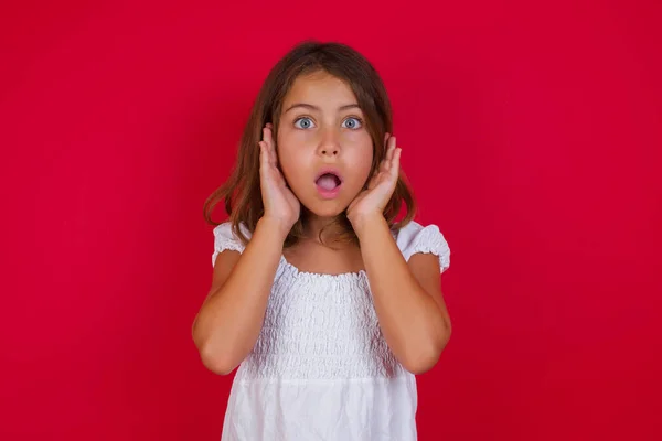 Little Caucasian Girl Beautiful Blue Eyes Scared Expression Keeps Hands — Stock Photo, Image