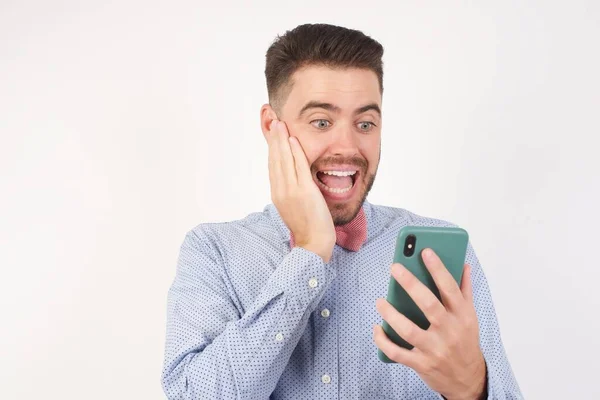 Happy Man Wearing Shirt Bow Tie Studio Holding Smartphone Mobile — Stock Photo, Image