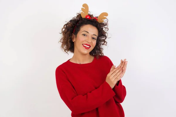 Woman Red Sweater Deer Horns Headband Posing Studio Smile Clapping — Stock Photo, Image