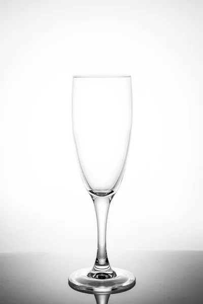 empty glasses for wine and champagne on a white background verti
