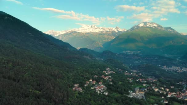 Aerial Flying Valley Green Forest Springtime Snowcapped Mountain Range Villages — Stock Video