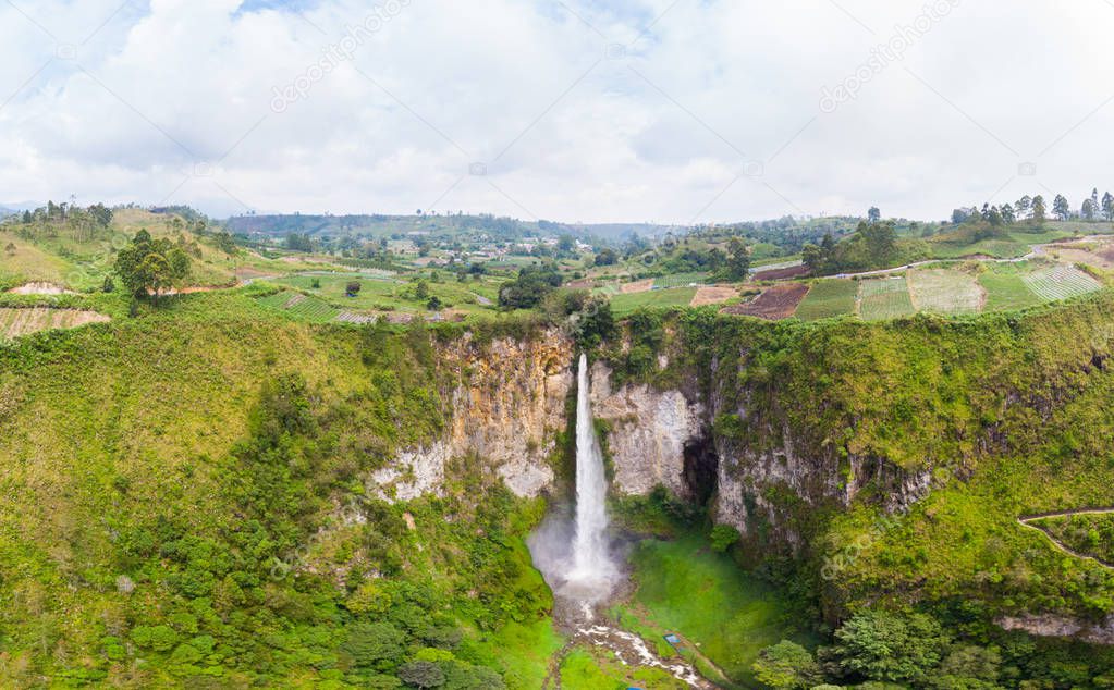 Aerial view Sipiso-piso waterfall in Sumatra, travel destination in Berastagi and Lake Toba, Indonesia. 