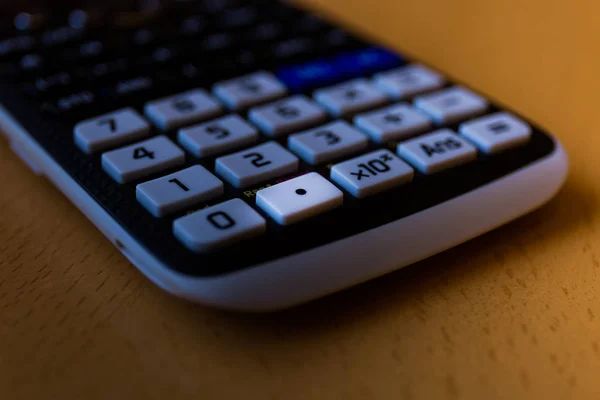 Decimal point key of a scientific calculator