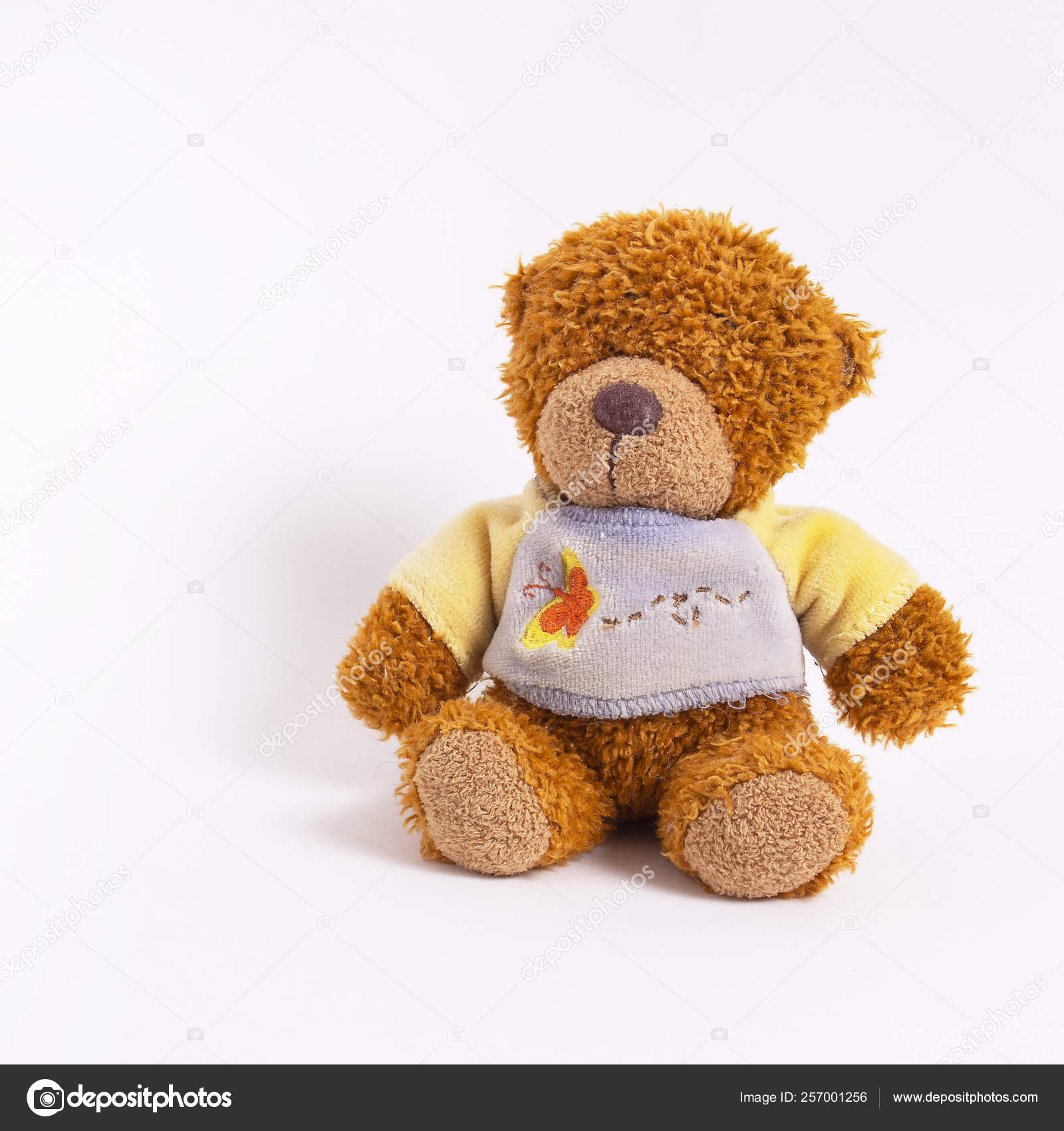 blue and yellow teddy bear