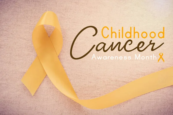 Yellow Gold Ribbon World Childhood Cancer Awareness Month — Stock Photo, Image