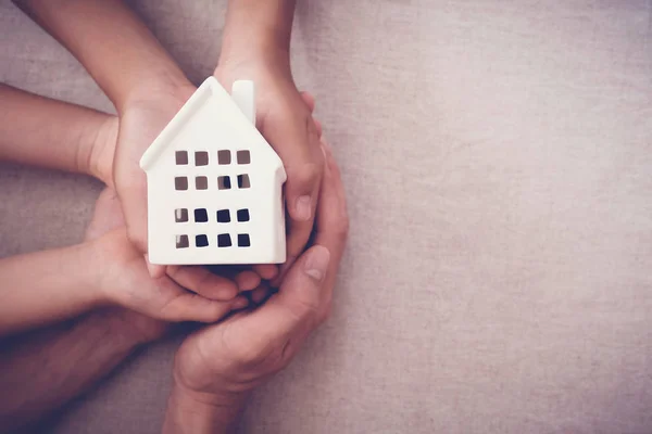 Adult Child Hands Holding Toy House Family Home Homeless Shelter — Stock Photo, Image