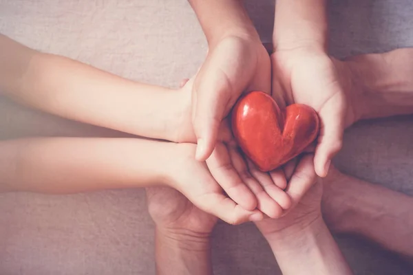 Handen Met Rood Hart Ziektekostenverzekering Donatie Concept — Stockfoto